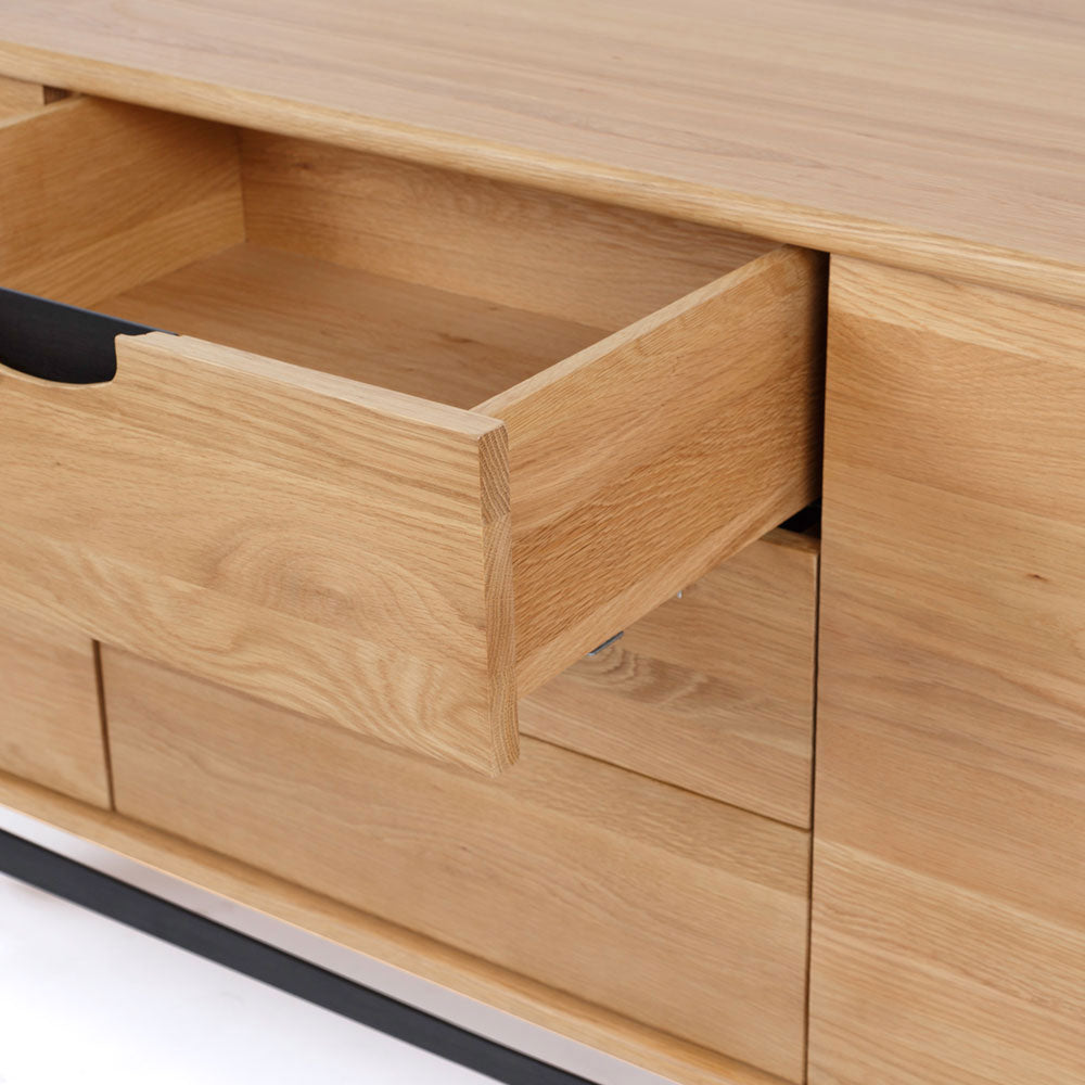 Close up of Flow Sideboard Natural showing timber drawer and black recessed handle