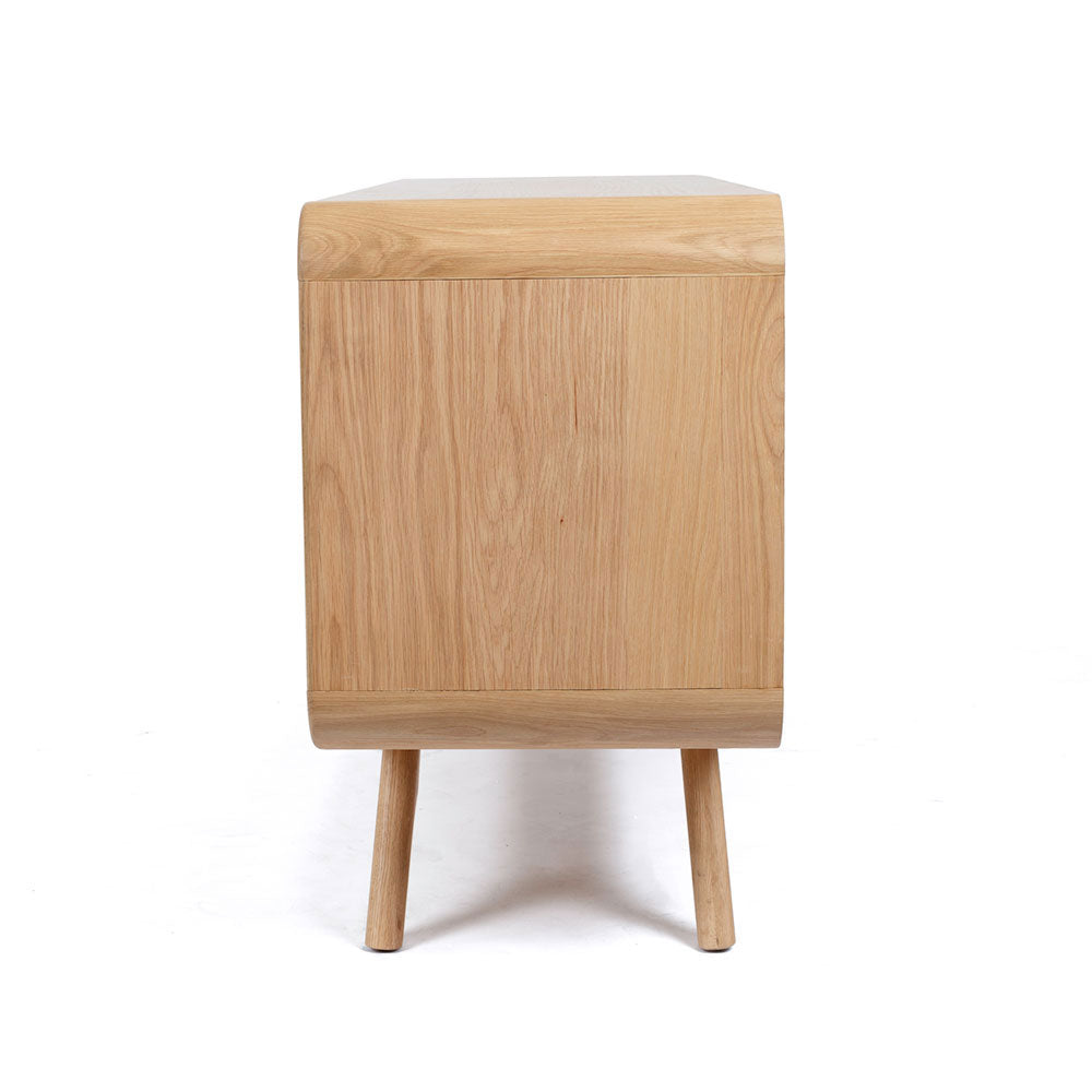 Side view of Flow Sideboard Natural showing compact profile, curved edge and timber legs