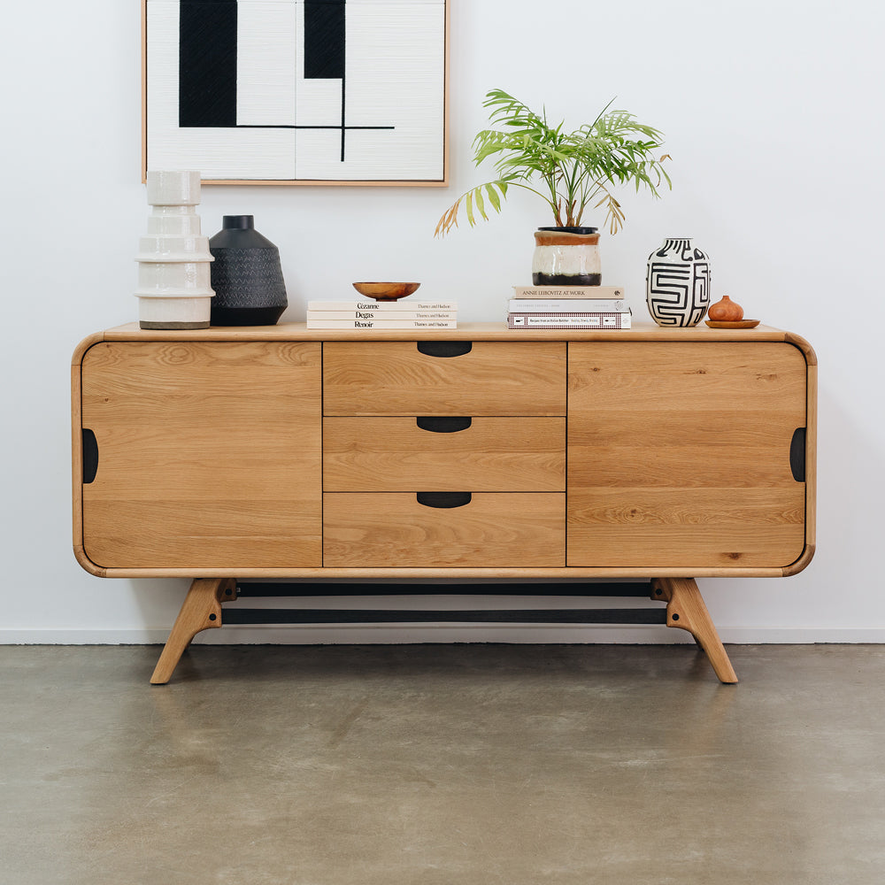 Flow Sideboard Natural styled with artwork, plants and decorative homewares