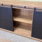Forged Iron Sideboard with sliding iron doors open to reveal internal timber shelving