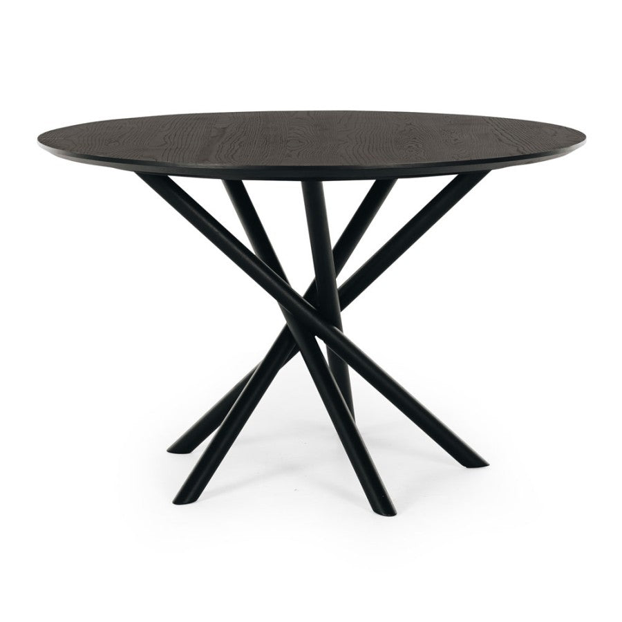 Side view of the Harper round dining table in Black Oak featuring a solid oak top and timber pedestal base.