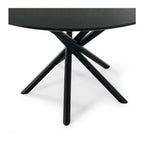 Close-up of the Harper Dining Table top highlighting the natural grain of the solid oak in a Black Oak finish.
