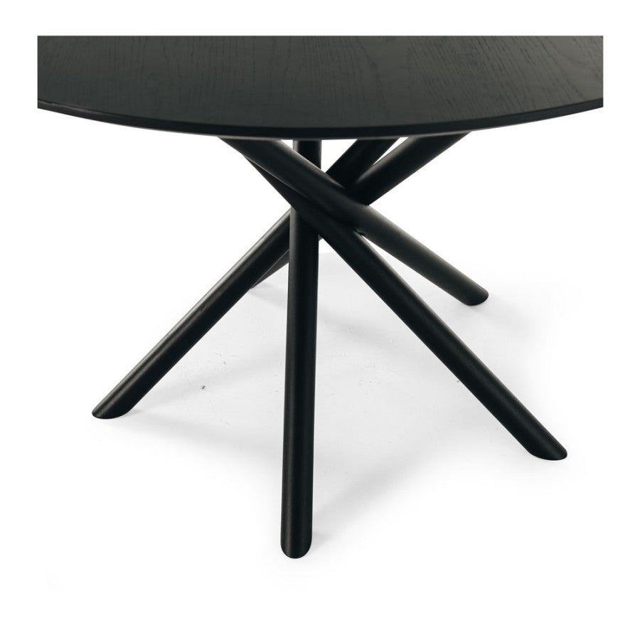 Close-up of the Harper Dining Table top highlighting the natural grain of the solid oak in a Black Oak finish.