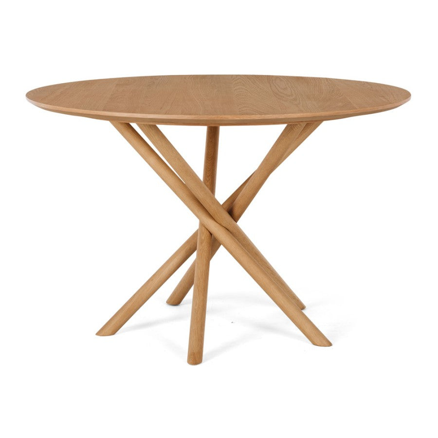 Side view of the Harper round dining table featuring a solid oak top and timber pedestal base.