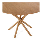 Close-up of the Harper Dining Table top highlighting the natural grain of the solid oak surface.