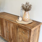 Henri rustic reclaimed elm sideboard angled view showing timber top, drawers and cupboard doors