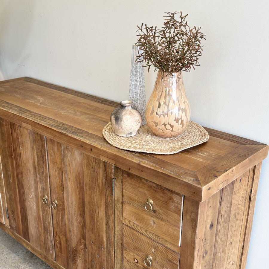 Henri rustic reclaimed elm sideboard angled view showing timber top, drawers and cupboard doors