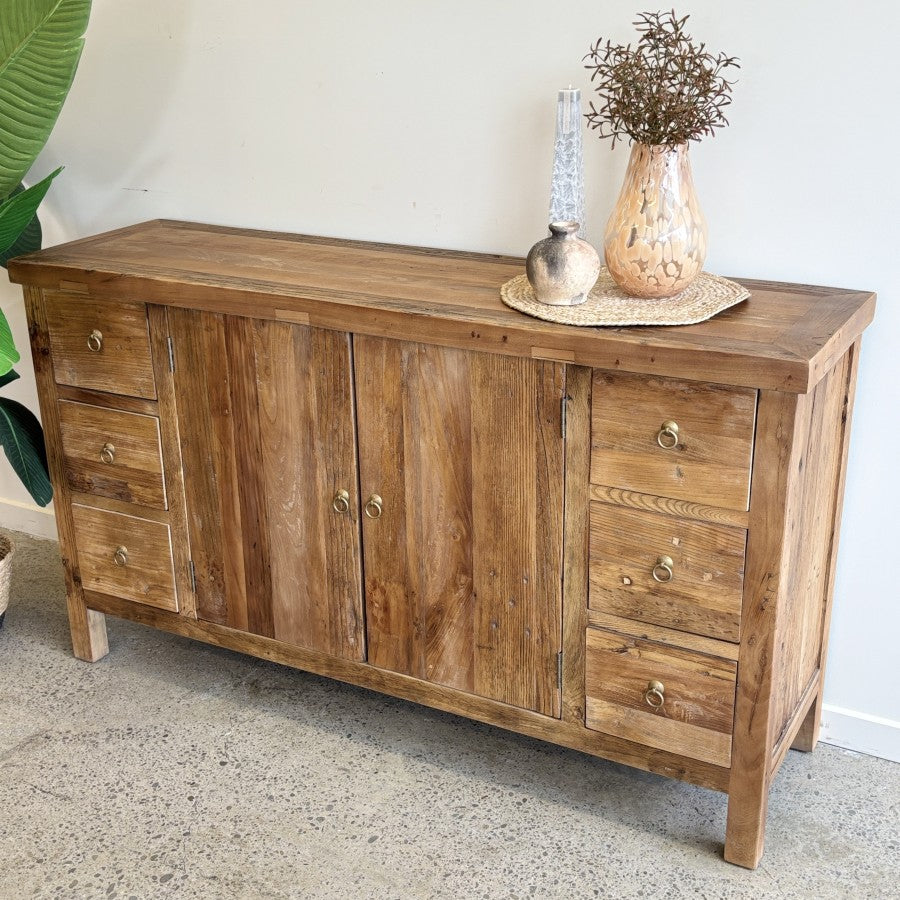 Henri reclaimed elm sideboard styled with decorative accessories showing rustic timber finish