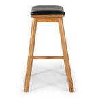 Side view of Hue Bar Stool showing natural oak legs and footrest