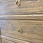 Close-up of the Jacob Sideboard drawer showing textured elm grain and brass-style ring handle