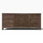 Front view of the Jacob Sideboard in Canadian Brown Elm with six drawers, two doors and brass-style ring handles