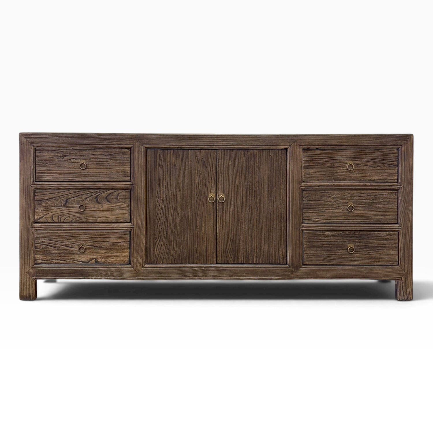 Front view of the Jacob Sideboard in Canadian Brown Elm with six drawers, two doors and brass-style ring handles
