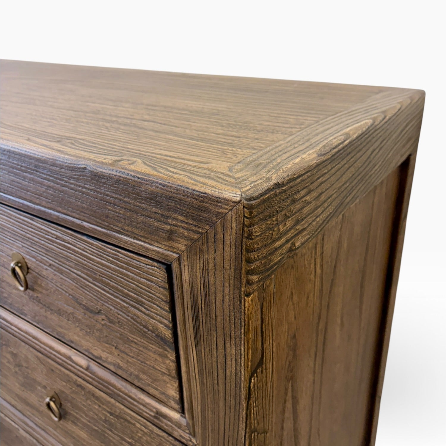 Close-up of the Jacob Sideboard showing the Canadian Brown finish and natural elm timber grain