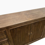 Detail view of the Jacob Sideboard in Canadian Brown Elm showing the timber top, double doors and ring handles