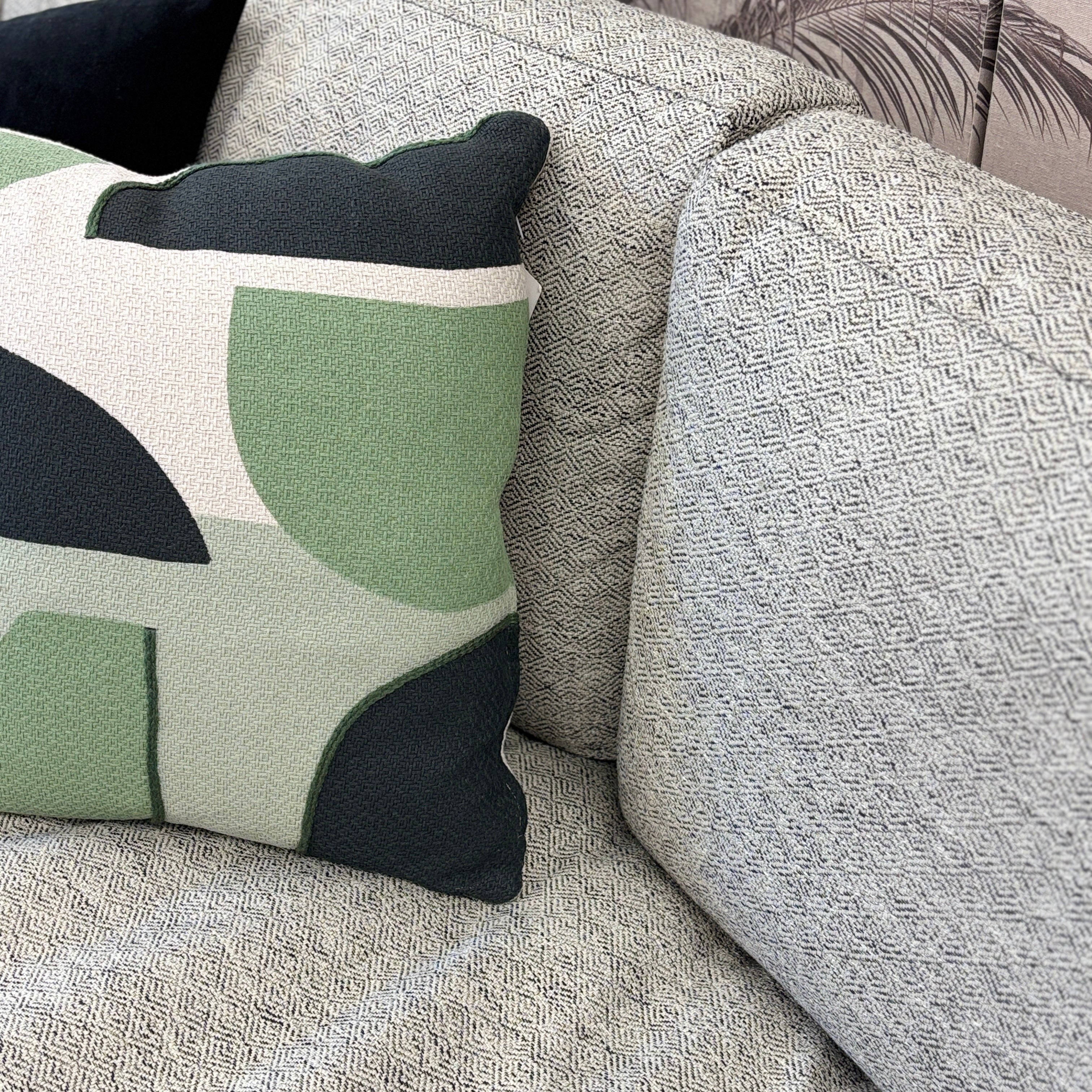 Close-up of the Josephine Sofa's generously padded seat and back cushions, showcasing the tailored upholstery and inviting comfort.