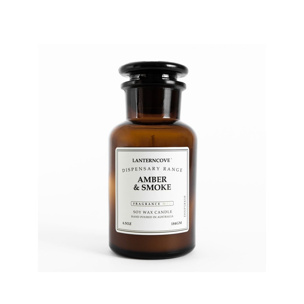 Lantern Cove Amber & Smoke soy wax candle in amber apothecary glass jar