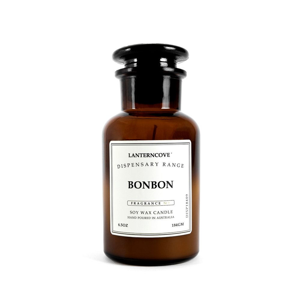 Lantern Cove Bonbon Toffee soy wax candle in amber apothecary glass jar
