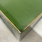 Close up of Lattice 2 Door Cupboard showing emerald green lacquered pine finish and edge detailing