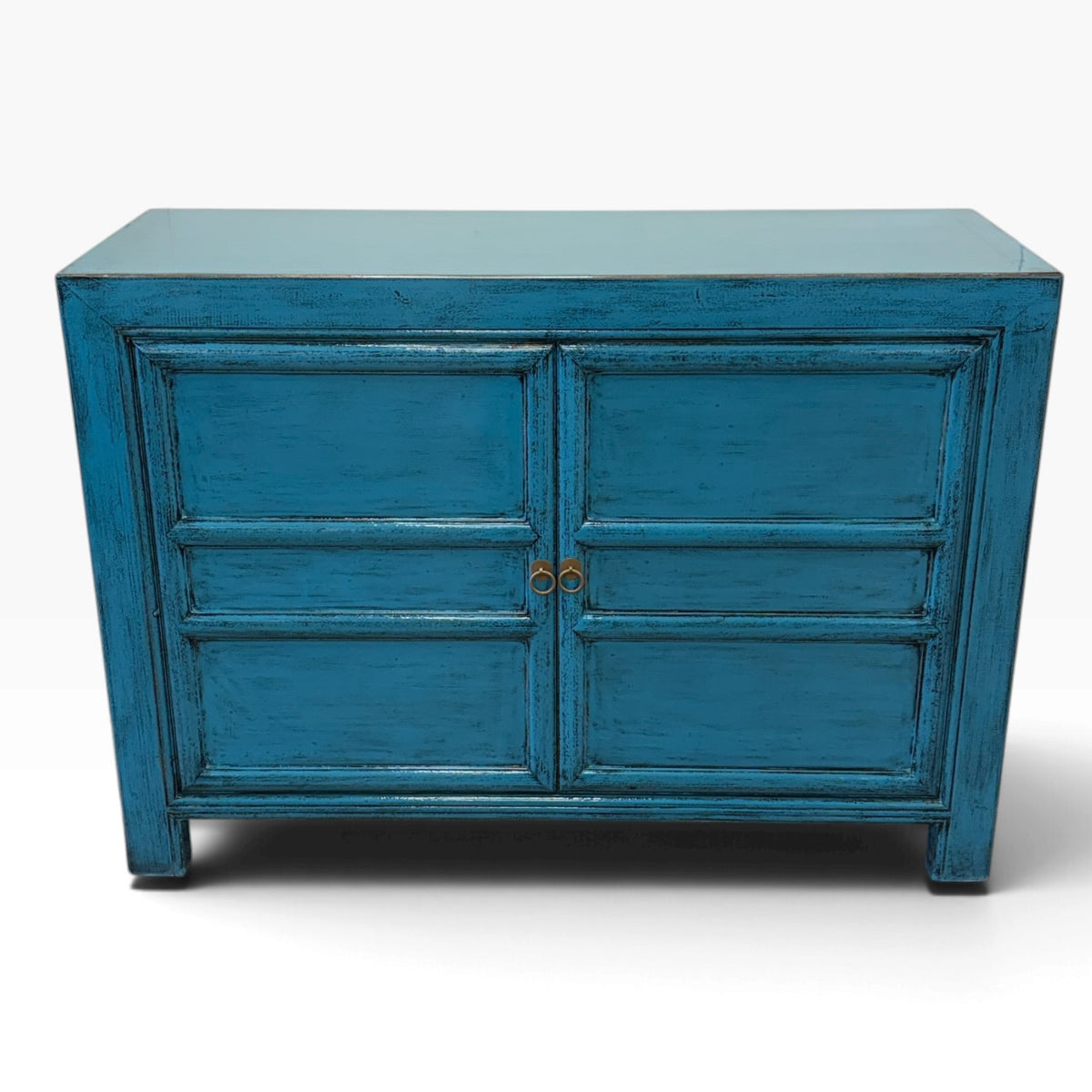 Lola Sideboard in Sky Blue showing the timber top, panelled doors and distressed blue finish