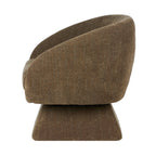 Side profile of the Lolo Swivel Chair in Cocoa, highlighting its flowing curved design, deep seat cushion and upholstered pedestal base.
