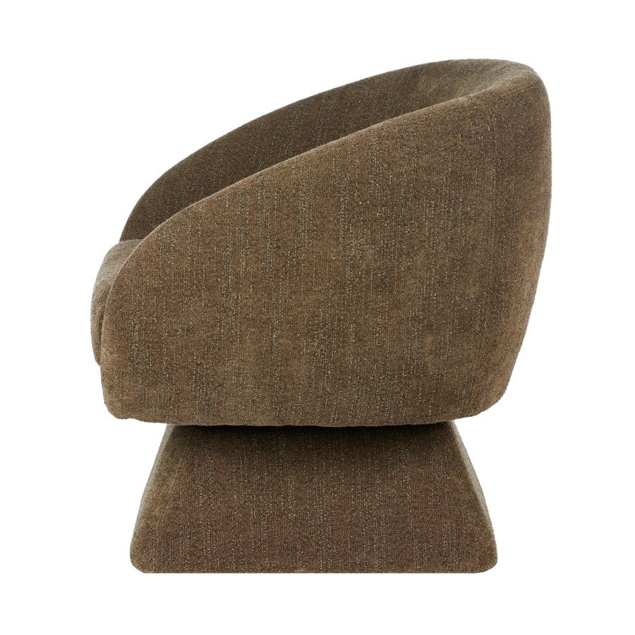 Side profile of the Lolo Swivel Chair in Cocoa, highlighting its flowing curved design, deep seat cushion and upholstered pedestal base.