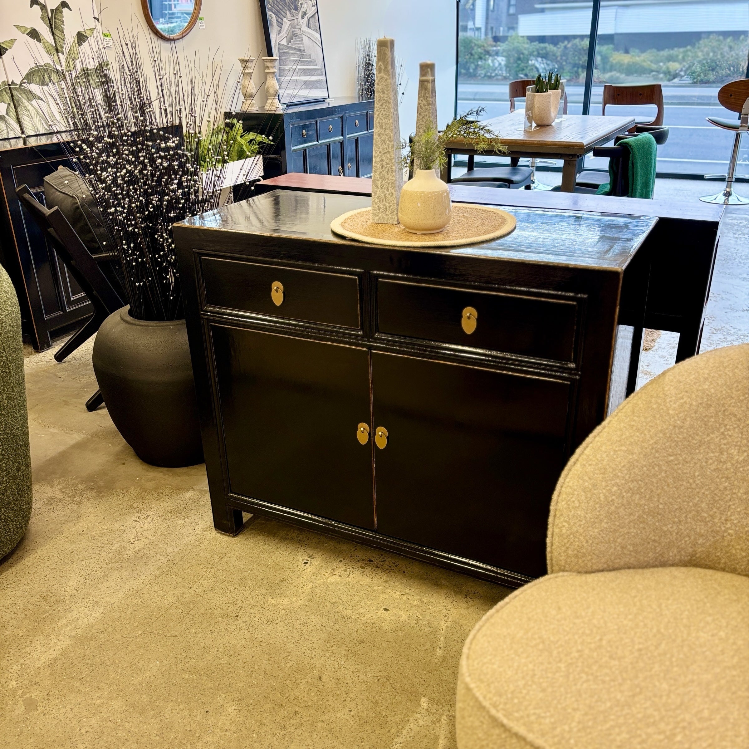 Loui Sideboard Black styled in a Christchurch furniture showroom with decorative accessories