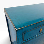 Loui Sideboard in Domican Blue showing distressed top and edge detailing