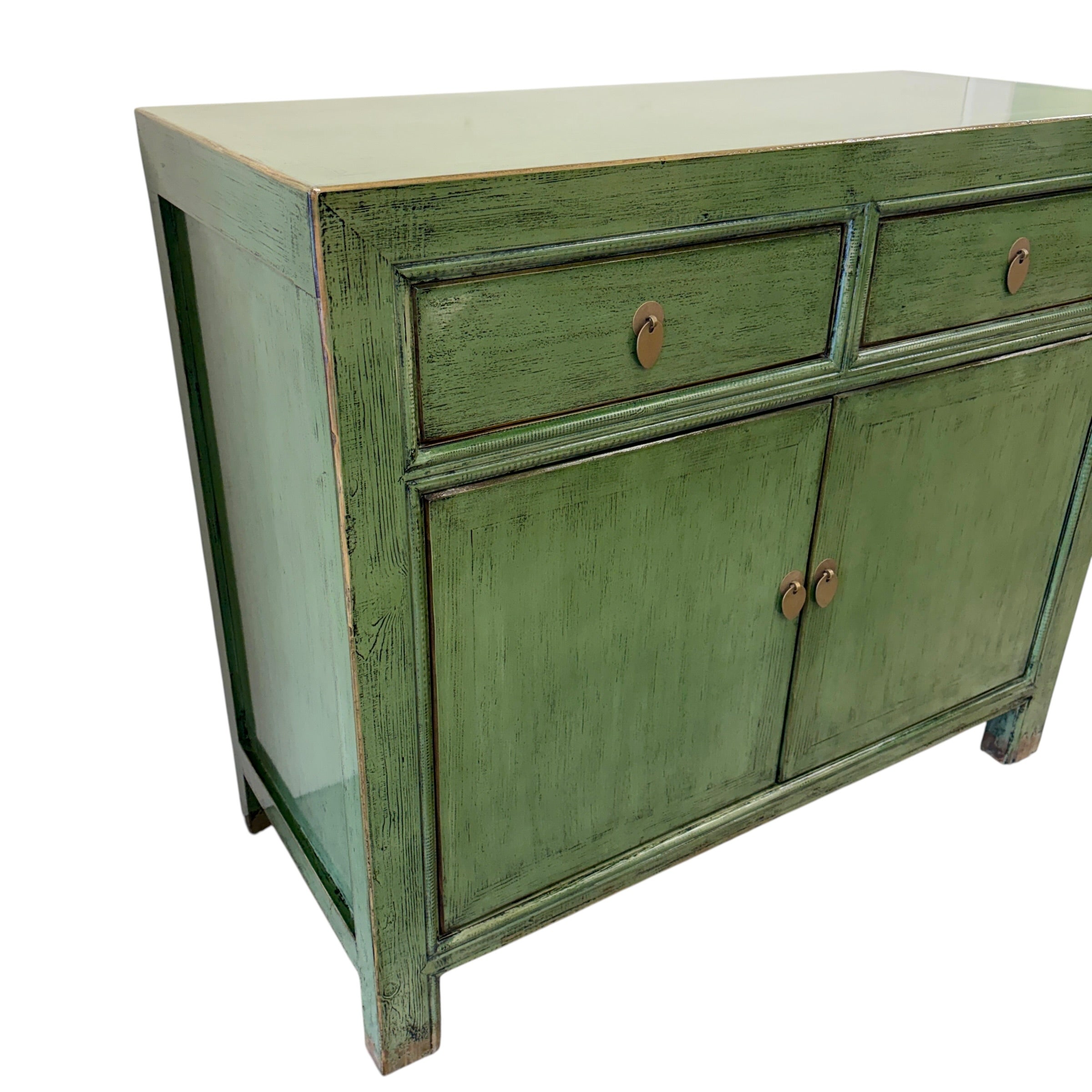 Angled view of Loui Sideboard in olive green showing compact two-door cabinet design