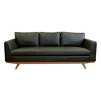 Lucca Sofa in Moss Green leather featuring clean contemporary lines, tailored cushions and solid timber legs.
