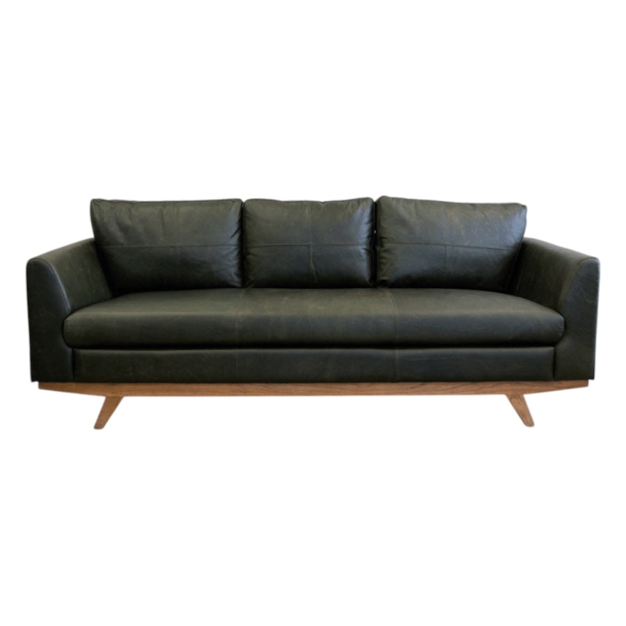 Lucca Sofa in Moss Green leather featuring clean contemporary lines, tailored cushions and solid timber legs.