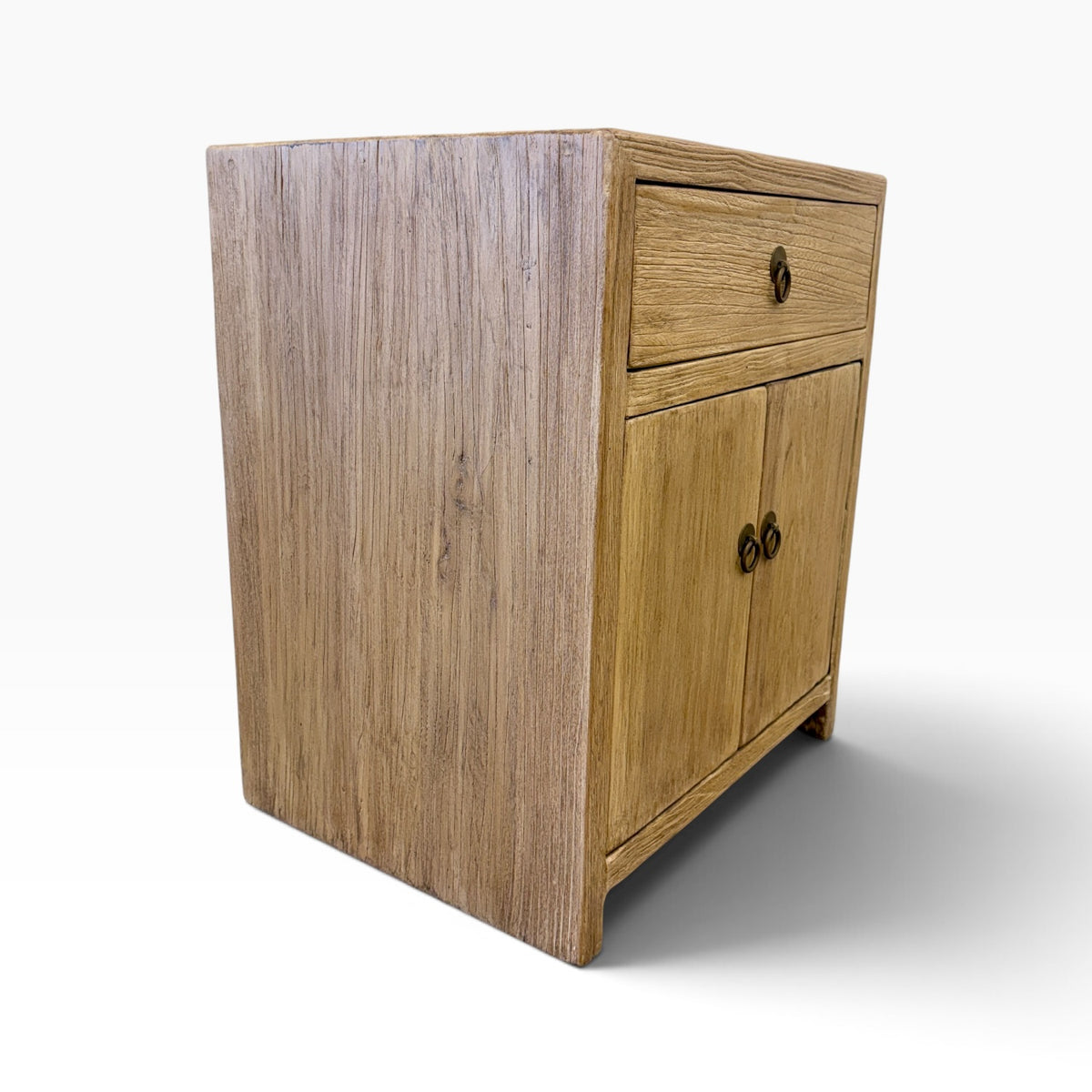 Side view of the Lydia Bedside showing the natural elm timber grain and compact cabinet design