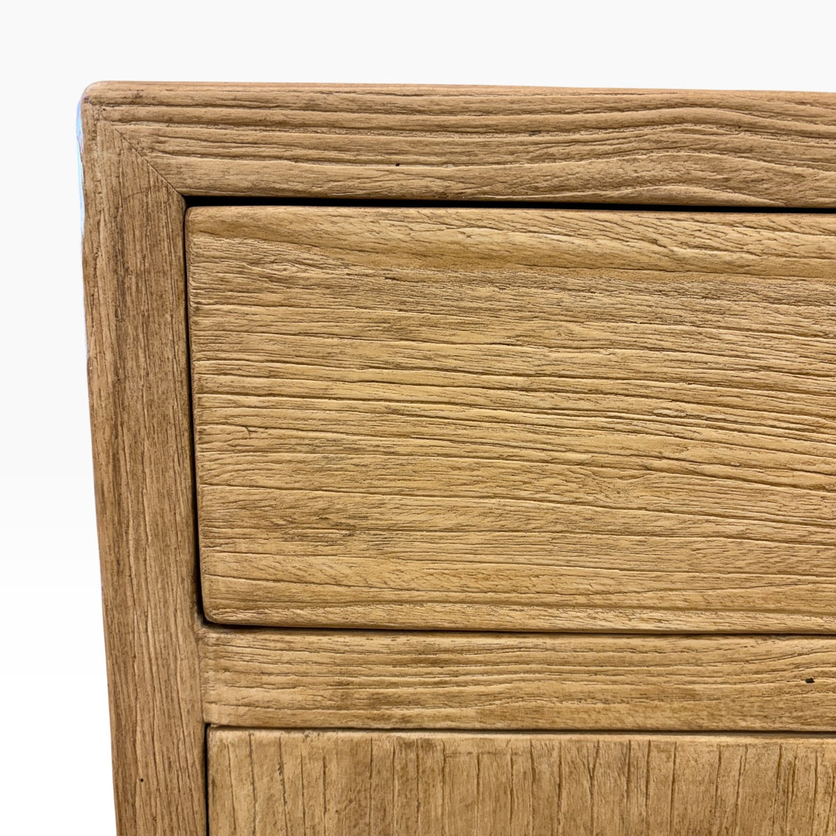 Close-up of the Lydia Bedside showing the natural elm timber grain and framed drawer detail