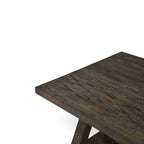 Close-up of the Lyon coffee table showing the rustic pale taupe mango wood grain and texture