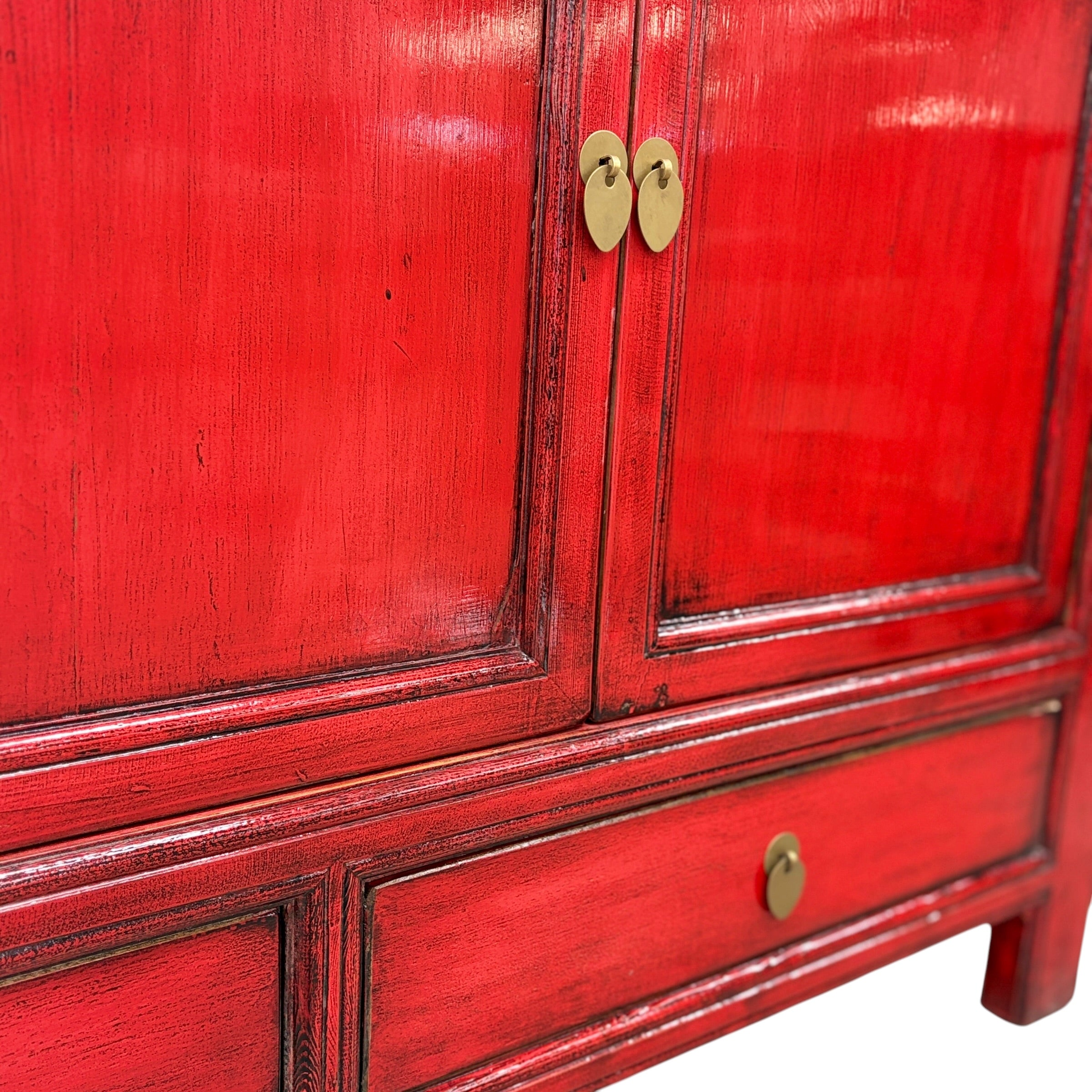 Margot Sideboard Pomegranate showing distressed doors, drawers and brass toned hardware