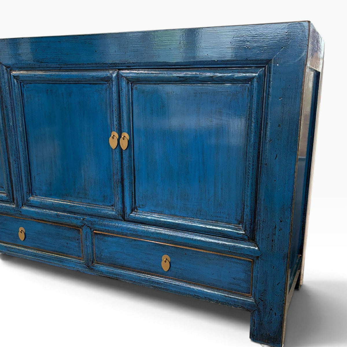 Margot Sideboard in Prussian Blue showing distressed finish, panelled doors and brass-toned handles