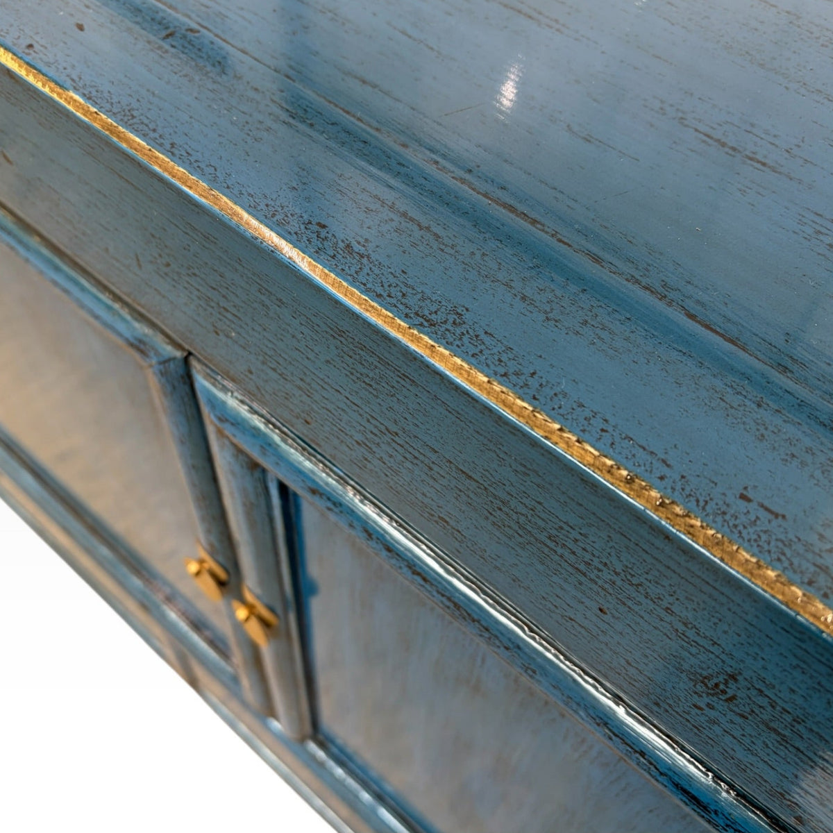 Margot Sideboard in Prussian Blue showing distressed timber edging and painted top