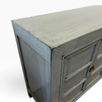 Angled view of the Maria Sideboard in distressed Glossy Grey
