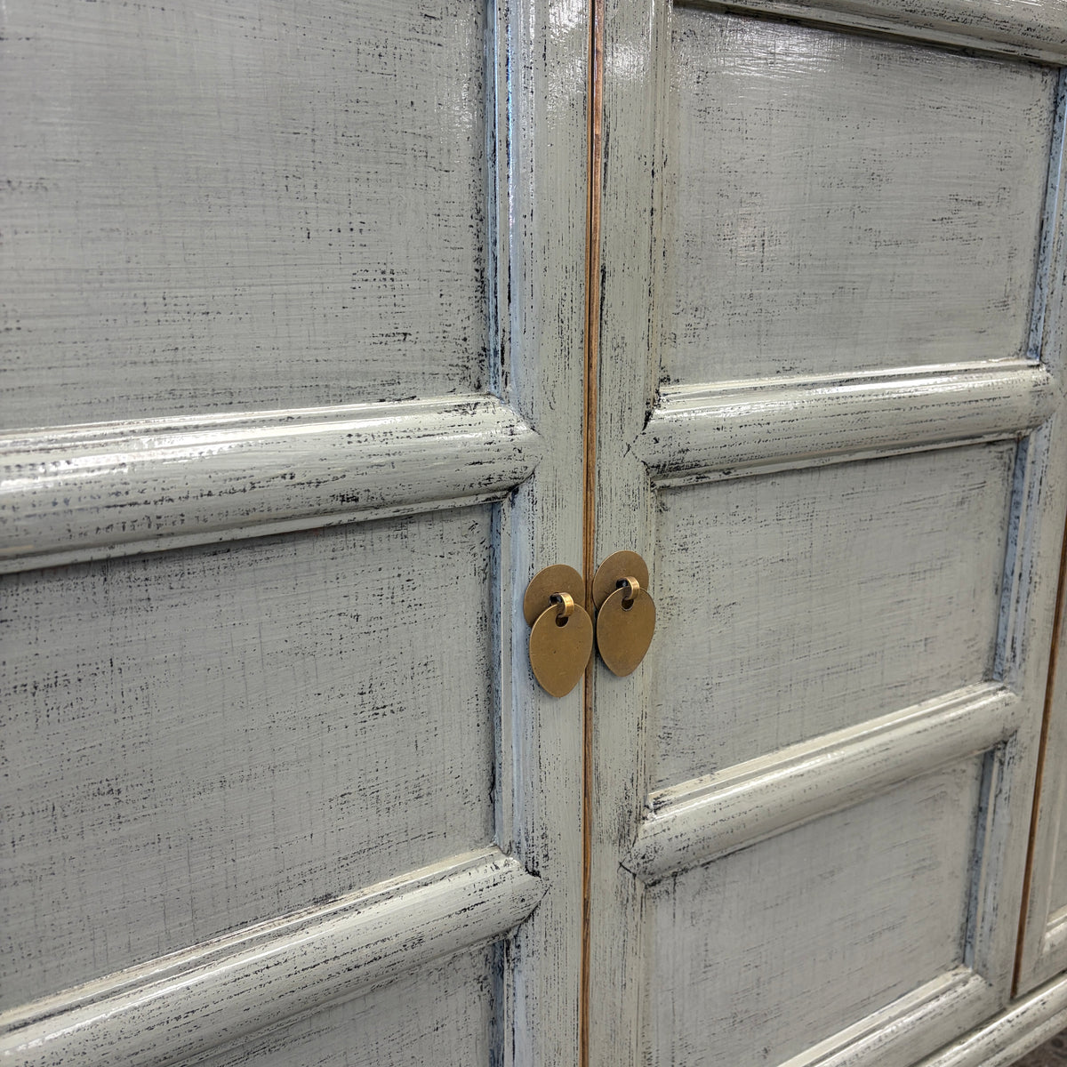 Maria Sideboard Glossy Grey door detail with brass drop handles