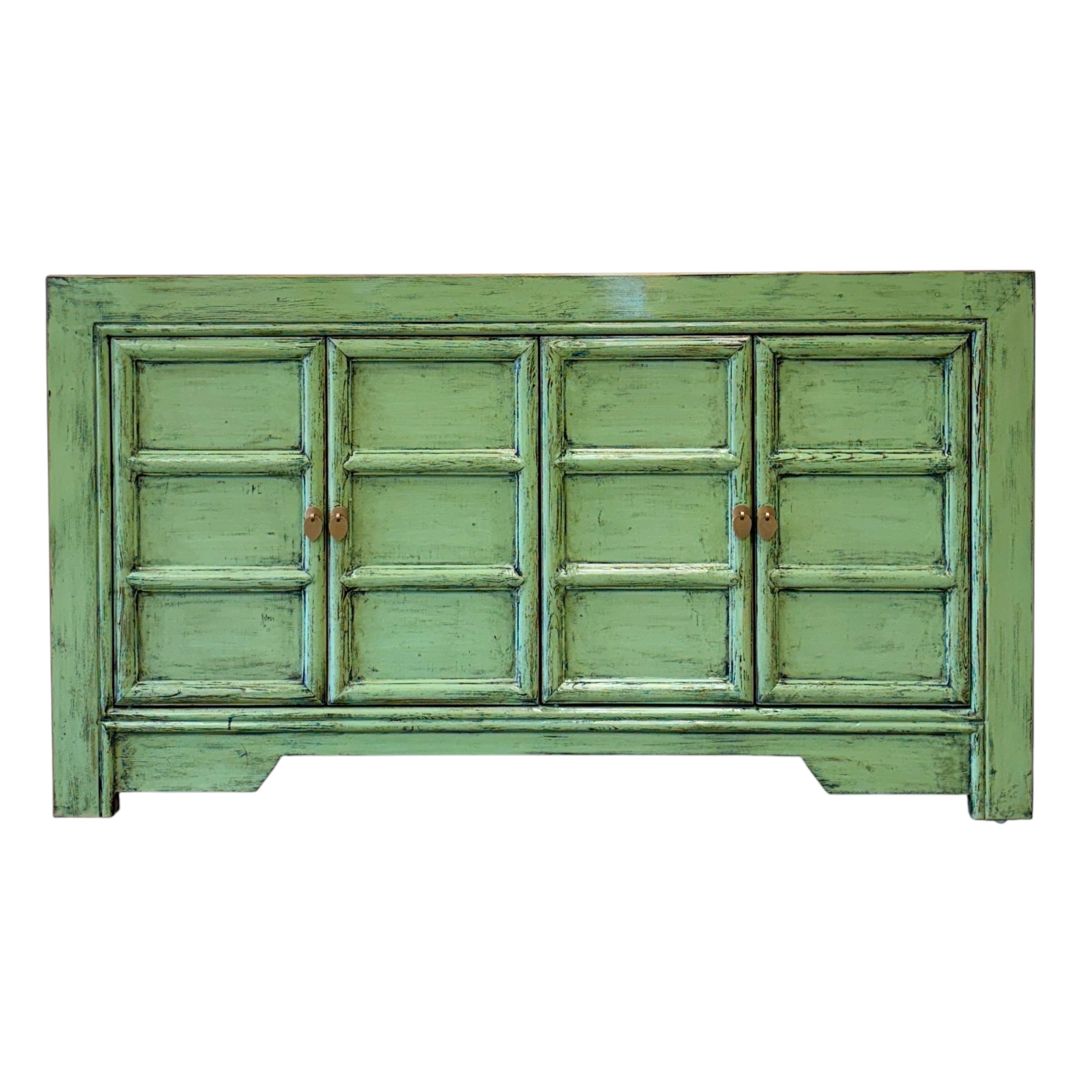 Front view of Maria Sideboard in spring green with four panelled cupboard doors and brass-toned handles