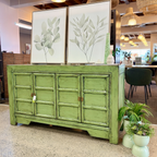 Maria Sideboard in spring green styled in a contemporary interior with botanical artwork