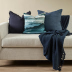 Mariella Cushion with feather inner styled with coordinating blue cushions