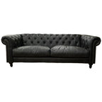 Maxwell Chesterfield sofa in black leather with deep button tufting and classic rolled arms.