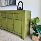 Merchant Sideboard in Olive showing distressed finish and generous storage