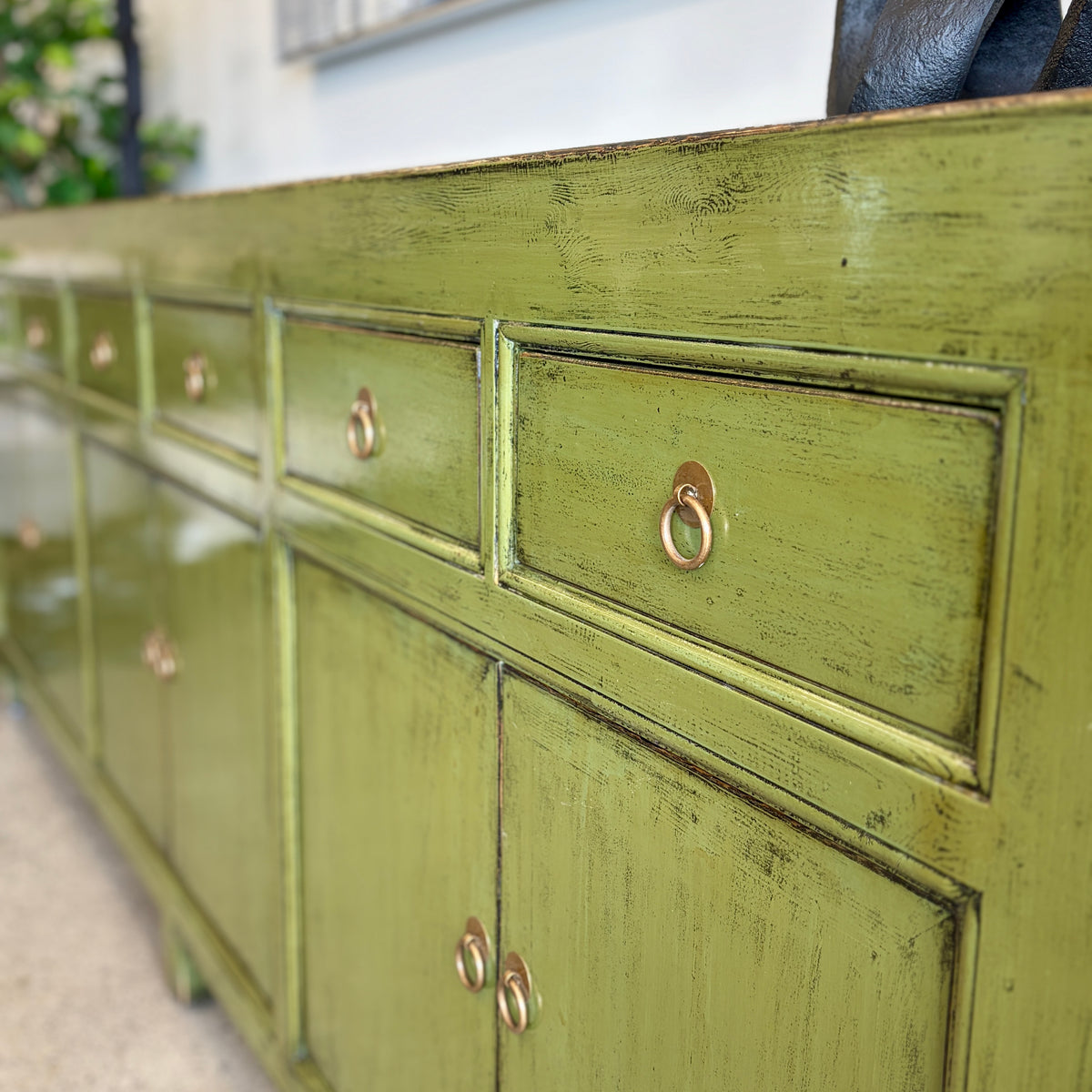 Merchant Sideboard in Olive showing drawer fronts and antique-style ring handles