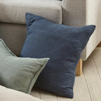 Milano Cushion in Diesel styled with neutral and soft green cushions