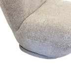 Close-up of the Milo Swivel Chair's Latte fabric, highlighting the woven texture and premium upholstery finish.