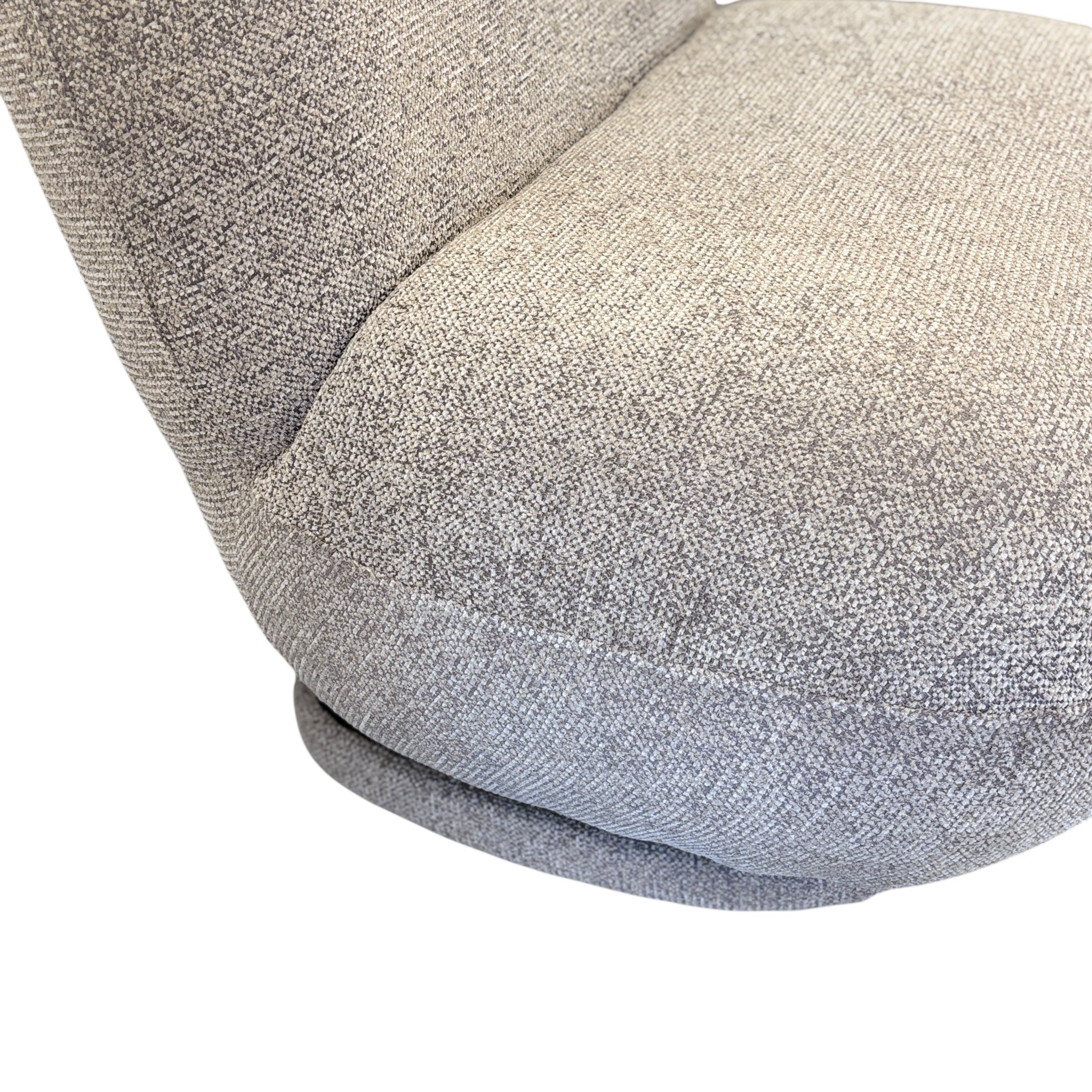 Close-up of the Milo Swivel Chair's Latte fabric, highlighting the woven texture and premium upholstery finish.