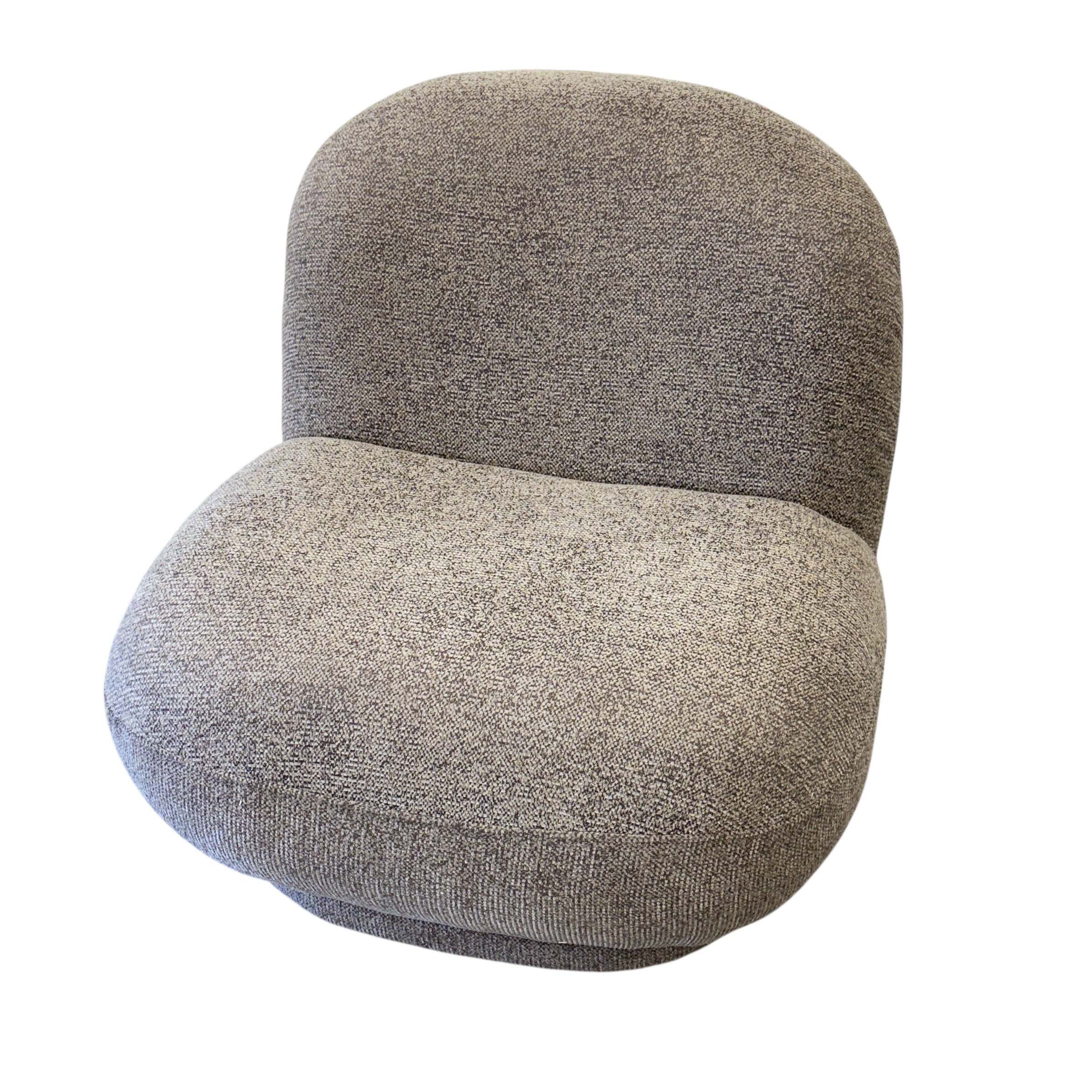 Side profile of the Milo Swivel Chair in Latte, showcasing its rounded silhouette and generously cushioned seat.