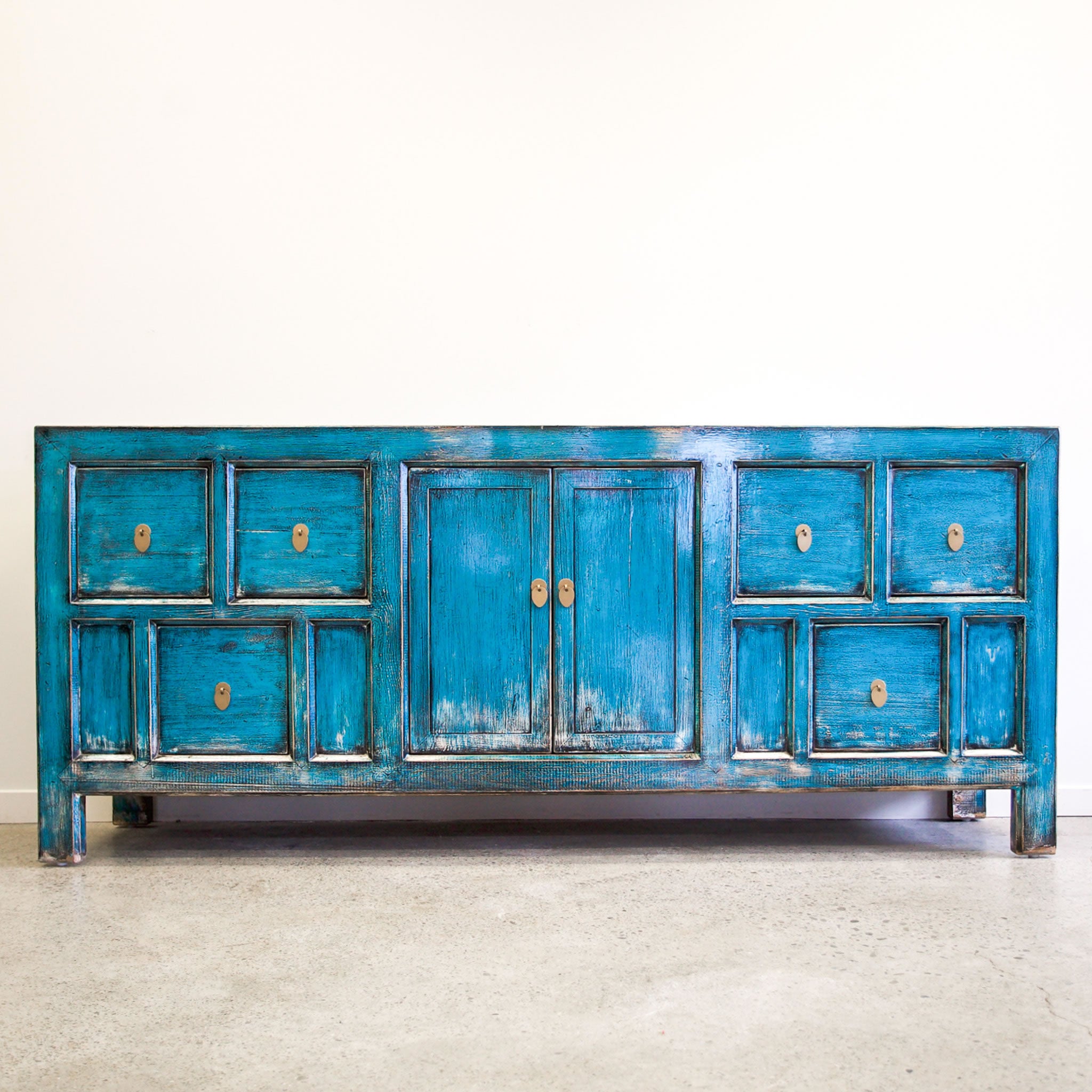 Morocco Sideboard Distressed Turquoise with six drawers, double doors and brass toned handles