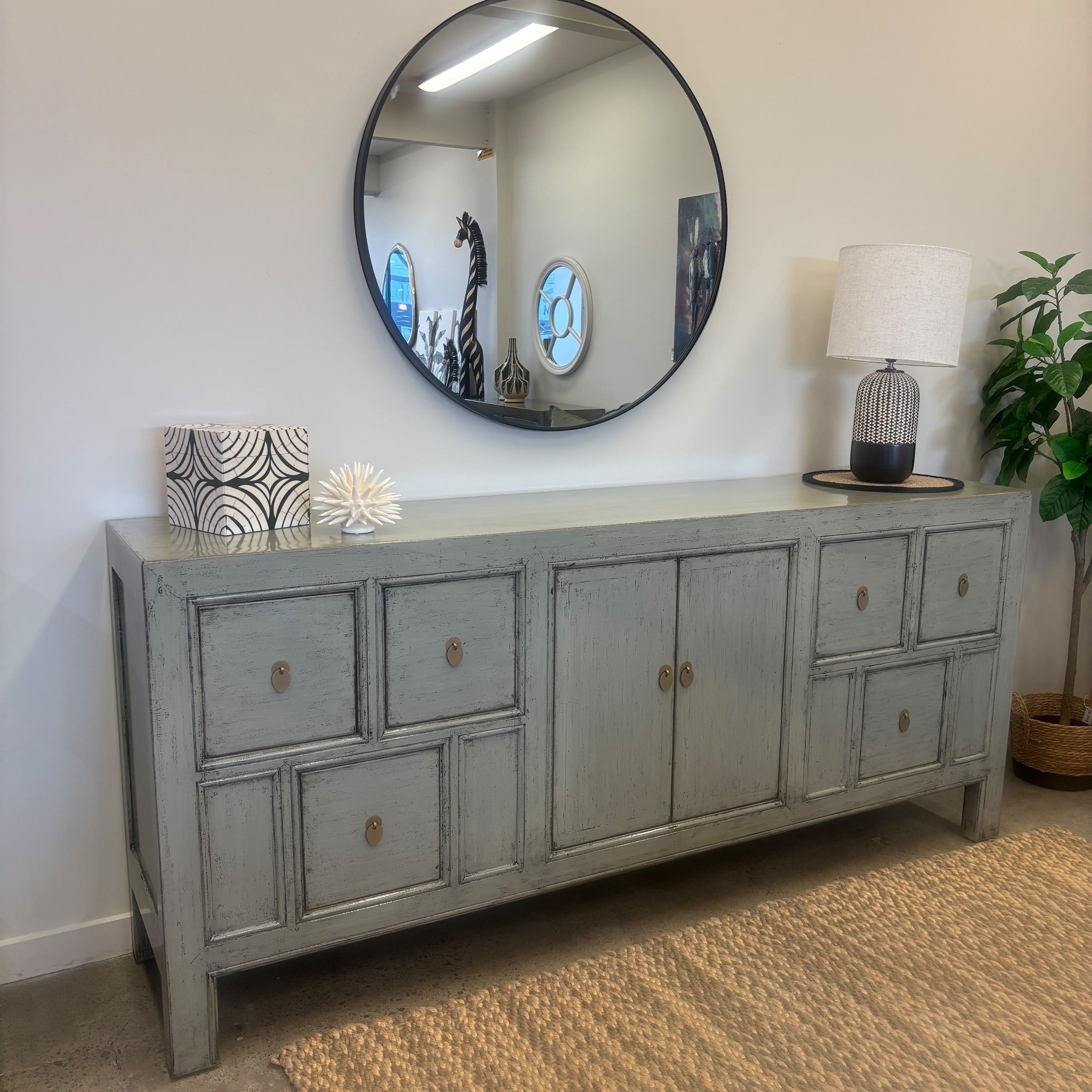 Front view of Morocco Sideboard in glossy grey with multiple cupboards and drawers